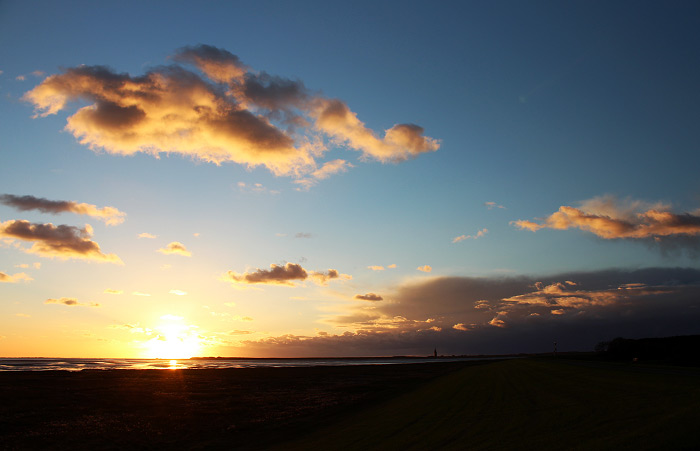 Sonnenuntergang vom Deich aus gesehen