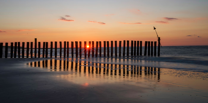 Sonnenuntergang an der Pfahlbuhne